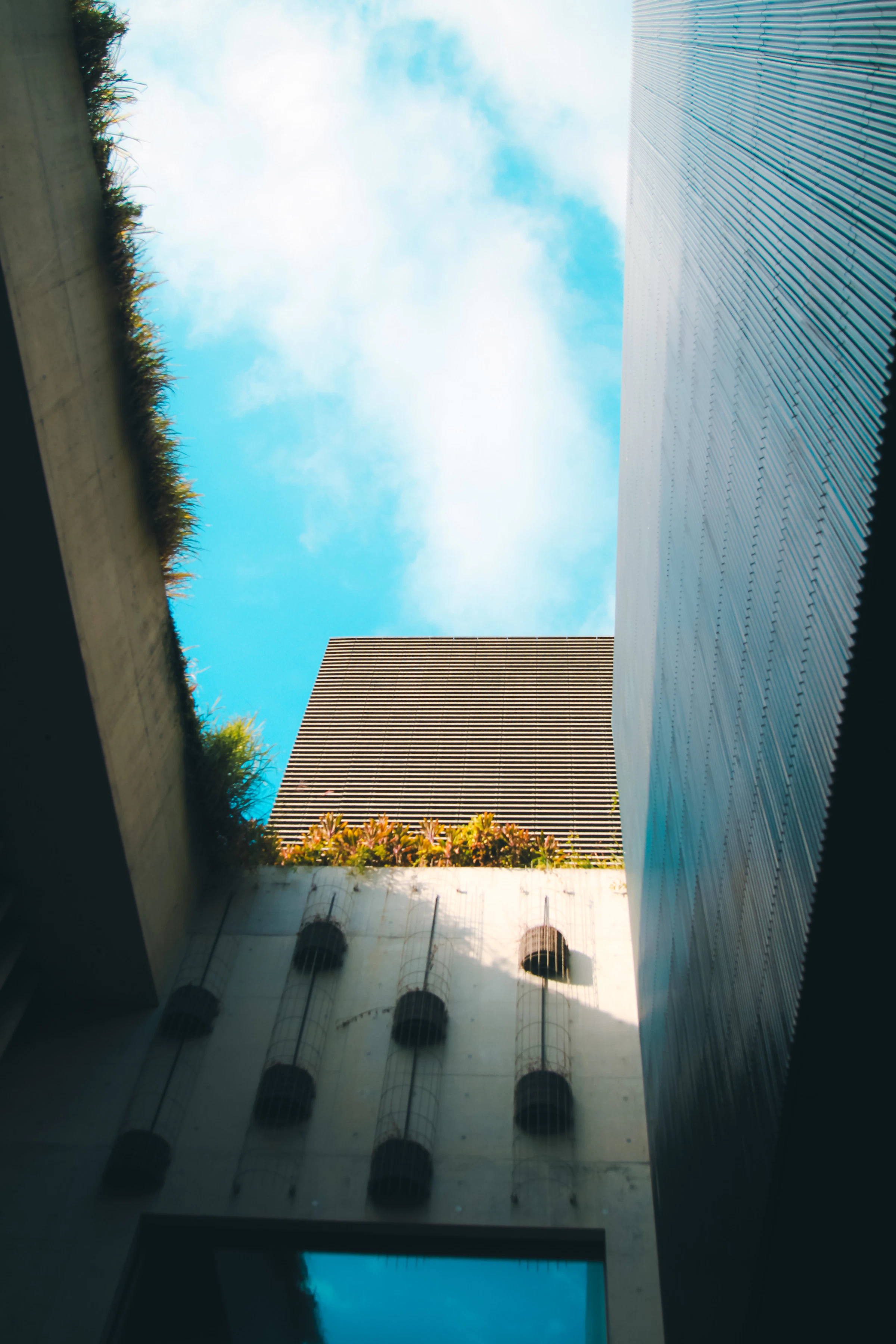 Upward architectural view inside the M Plus cultural district