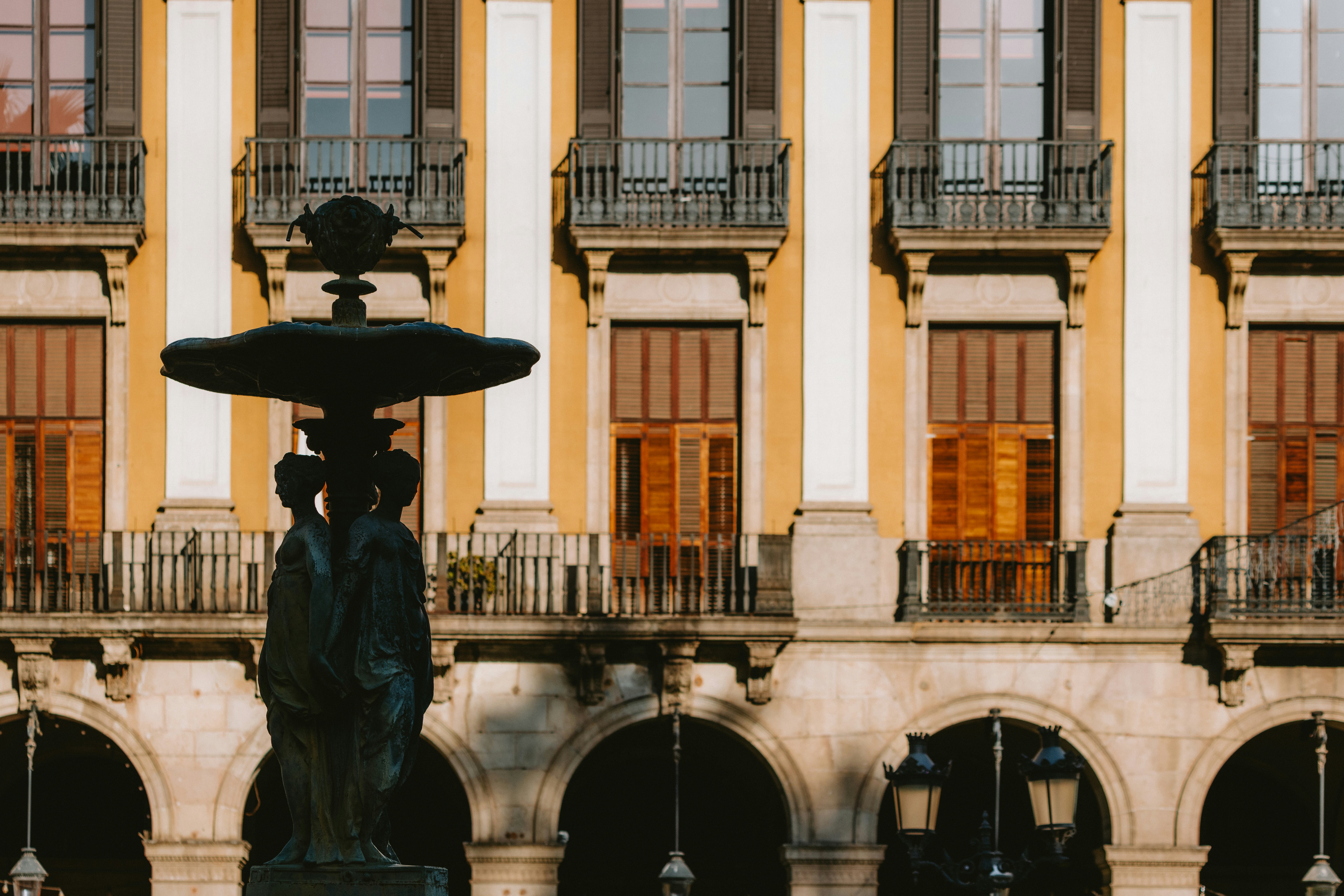 A building with a fountain in front of it