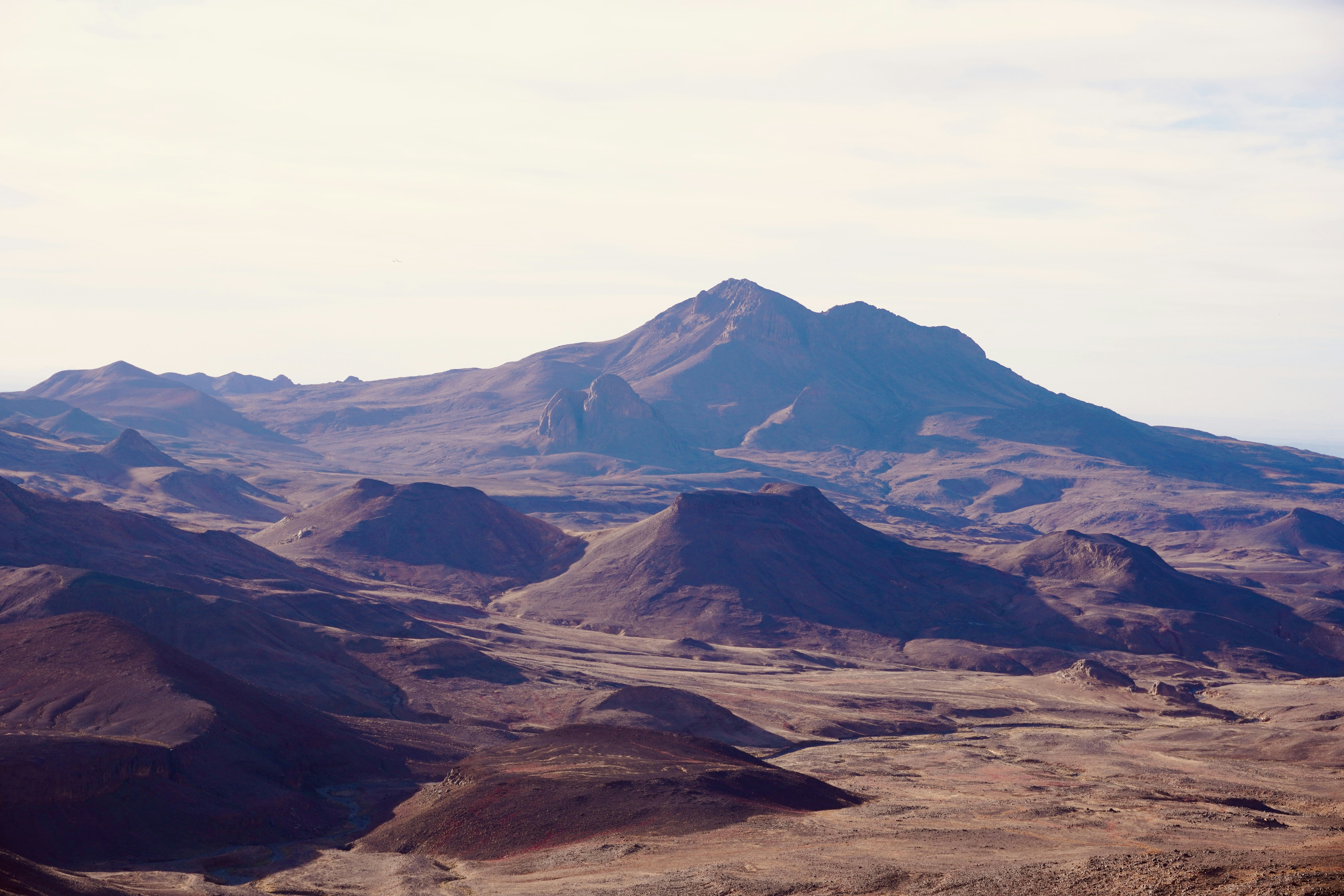 A view of a mountain range from a distance