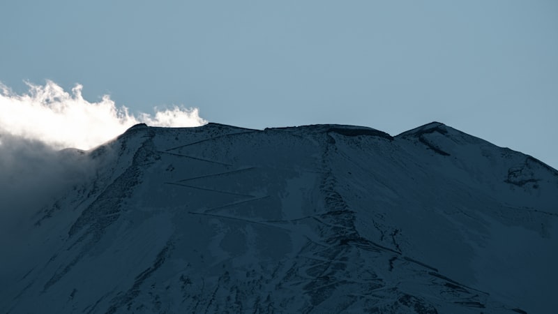 snowboard halfpipe aerial trick, ski slope terrain park, winter olympics podium, female snowboarder