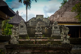A group of statues sitting next to each other