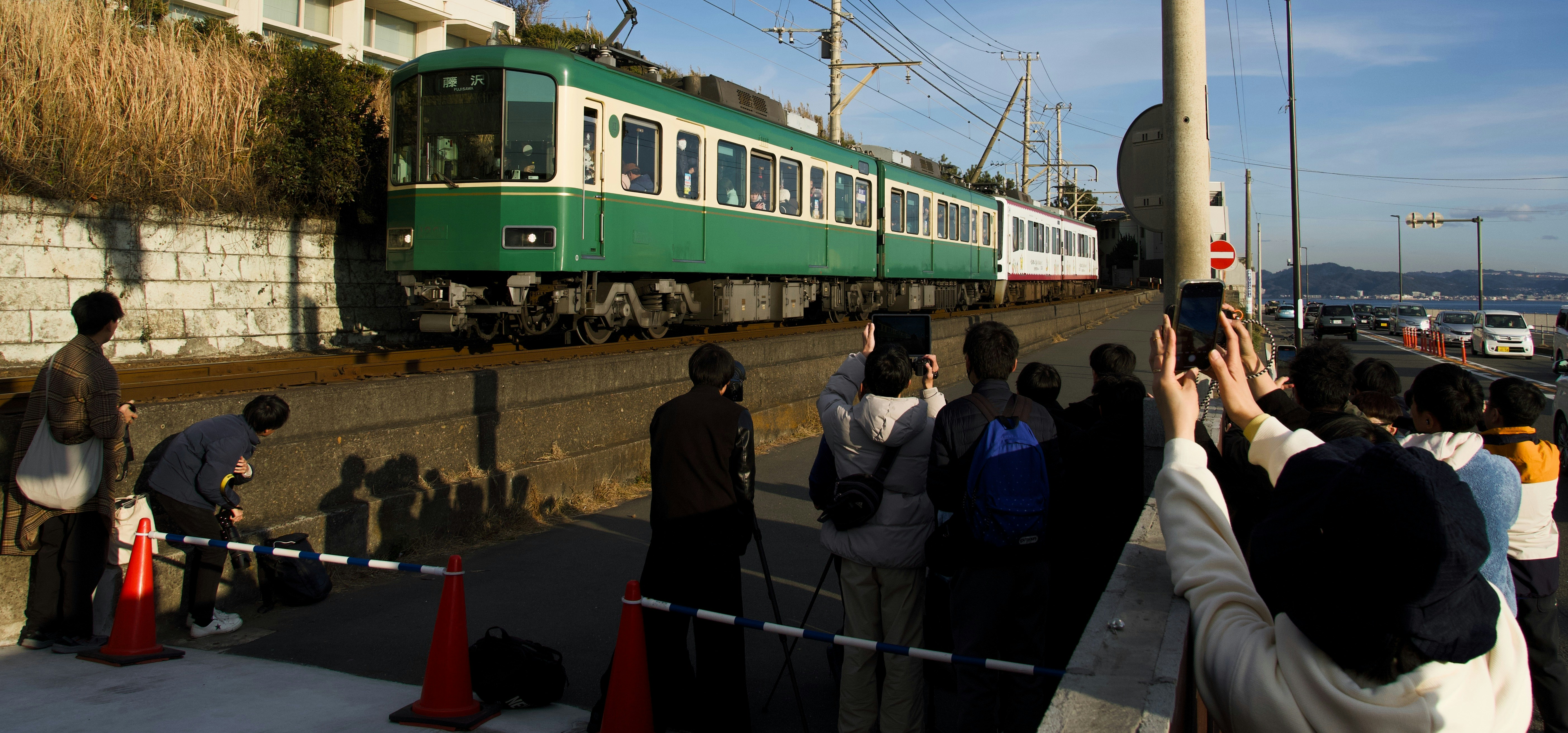 Japan Rail Pass held in hand on a Shinkansen train