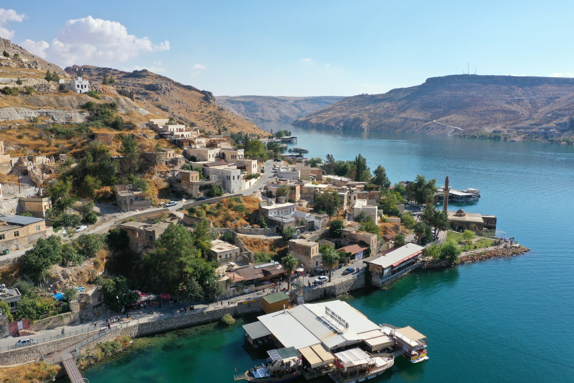 An aerial view of a small town on a lake