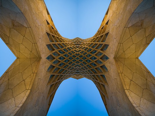 The latticed underside of the Azadi Tower — Tehran, Iran