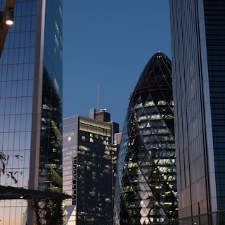 A group of tall buildings sitting next to each other