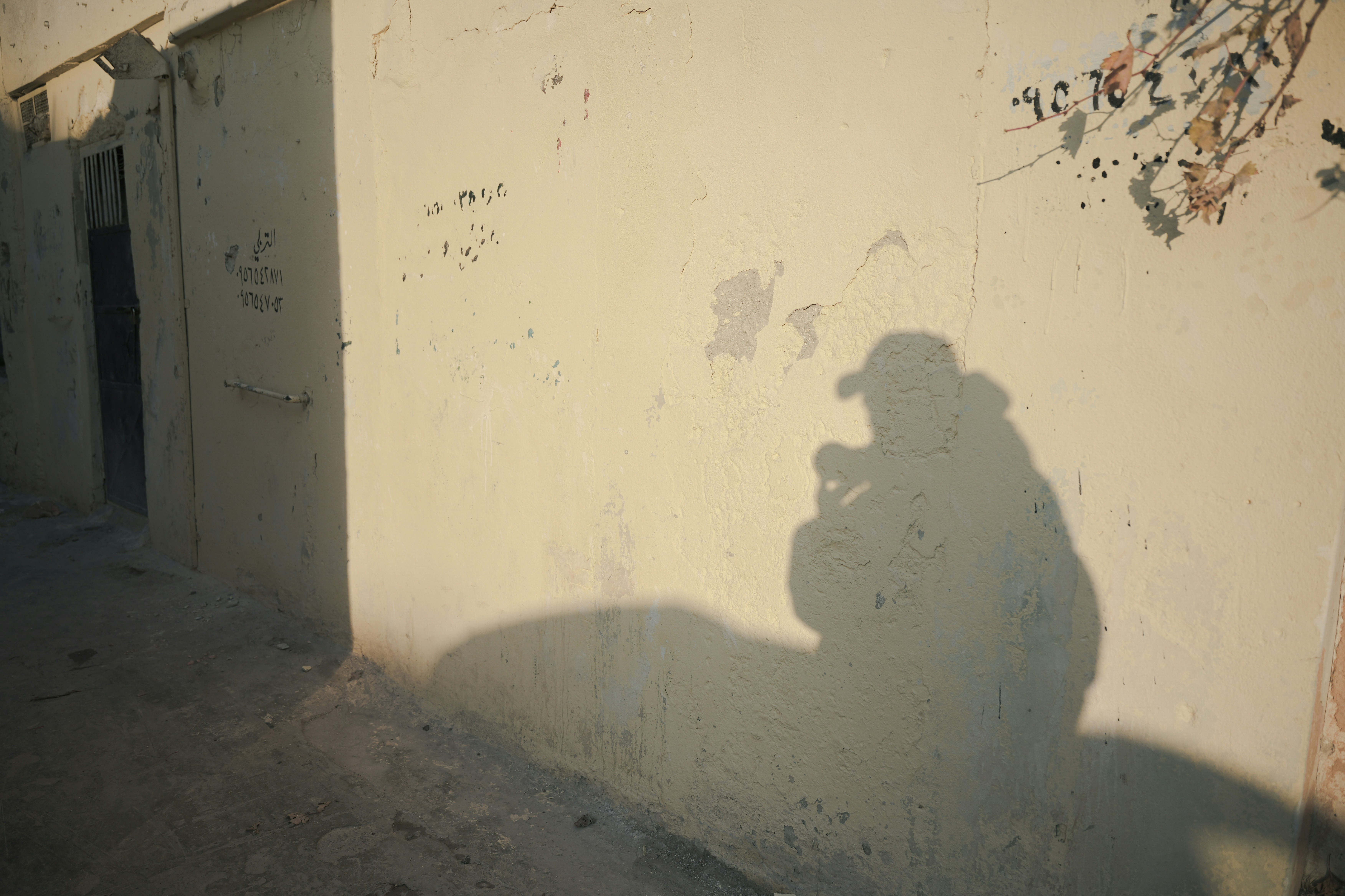 A shadow of a person on a wall