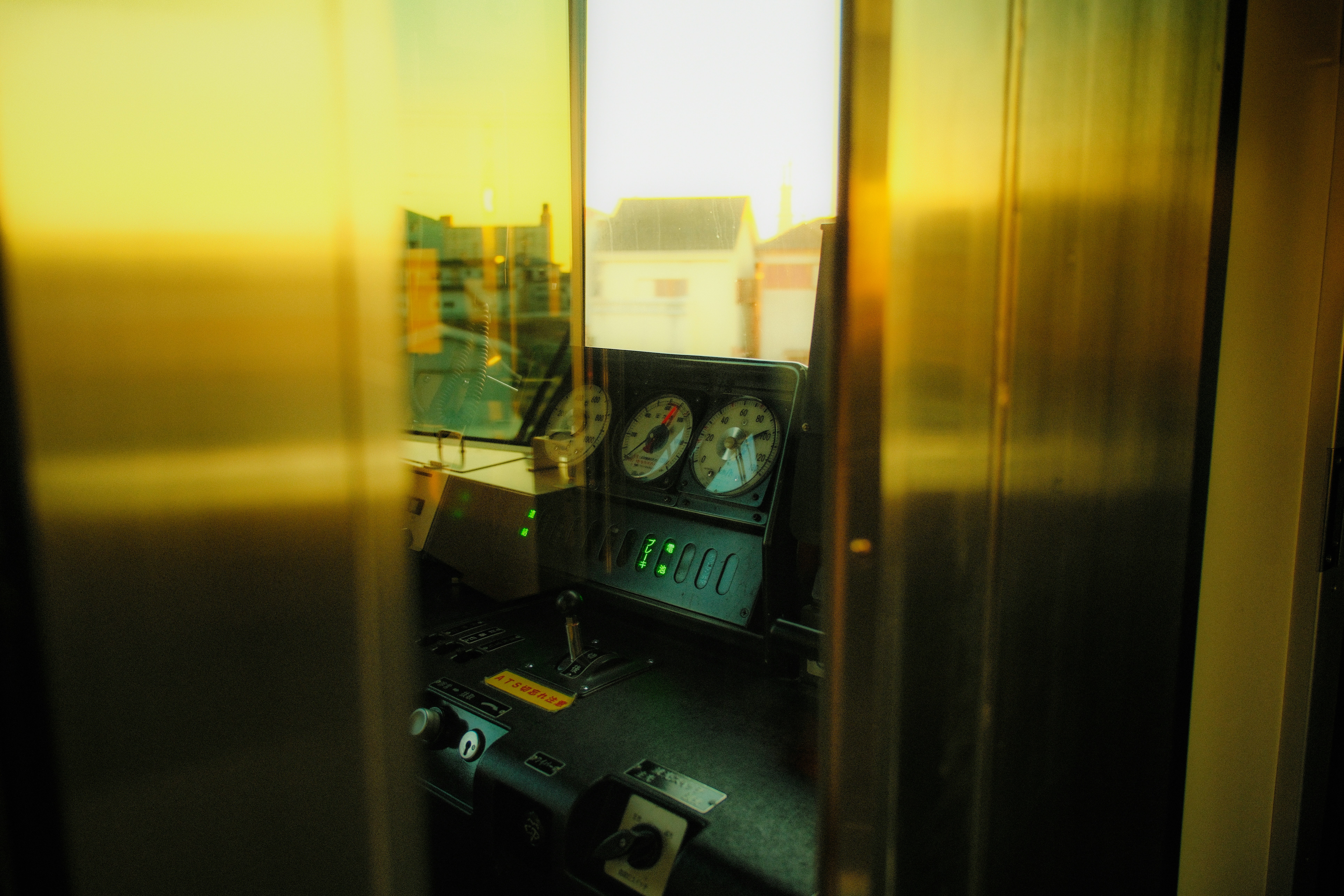 A view of a metallic refrigerator in a kitchen