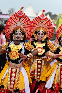 A group of people that are standing in the street
