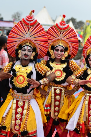 A group of people that are standing in the street