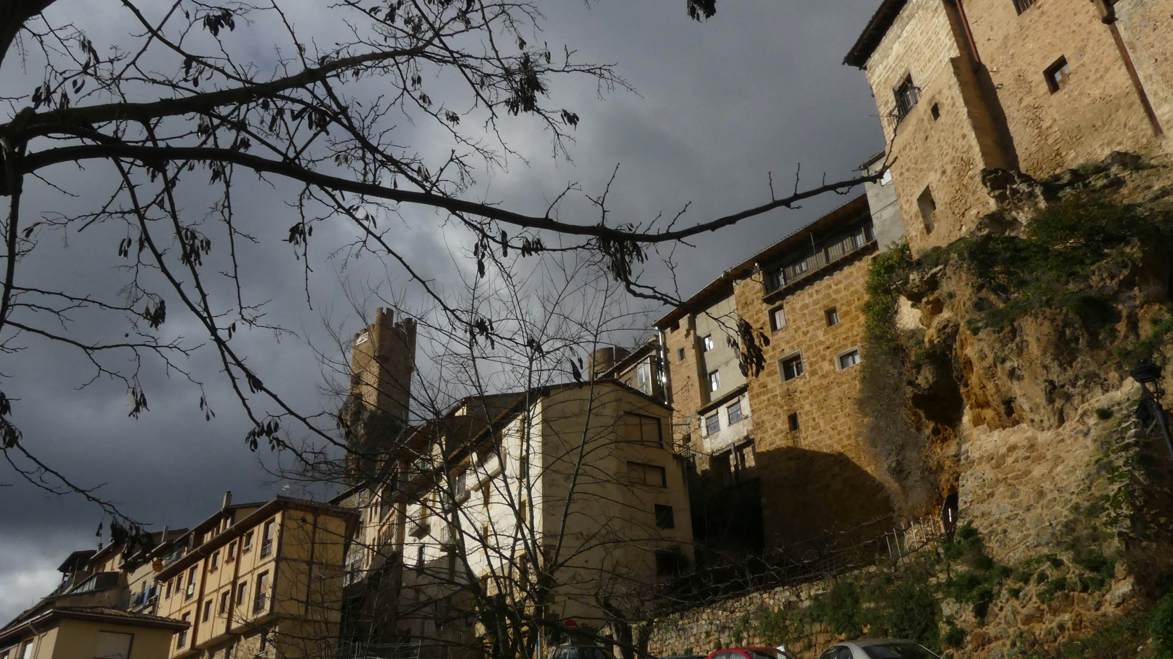 A group of buildings sitting on the side of a hill