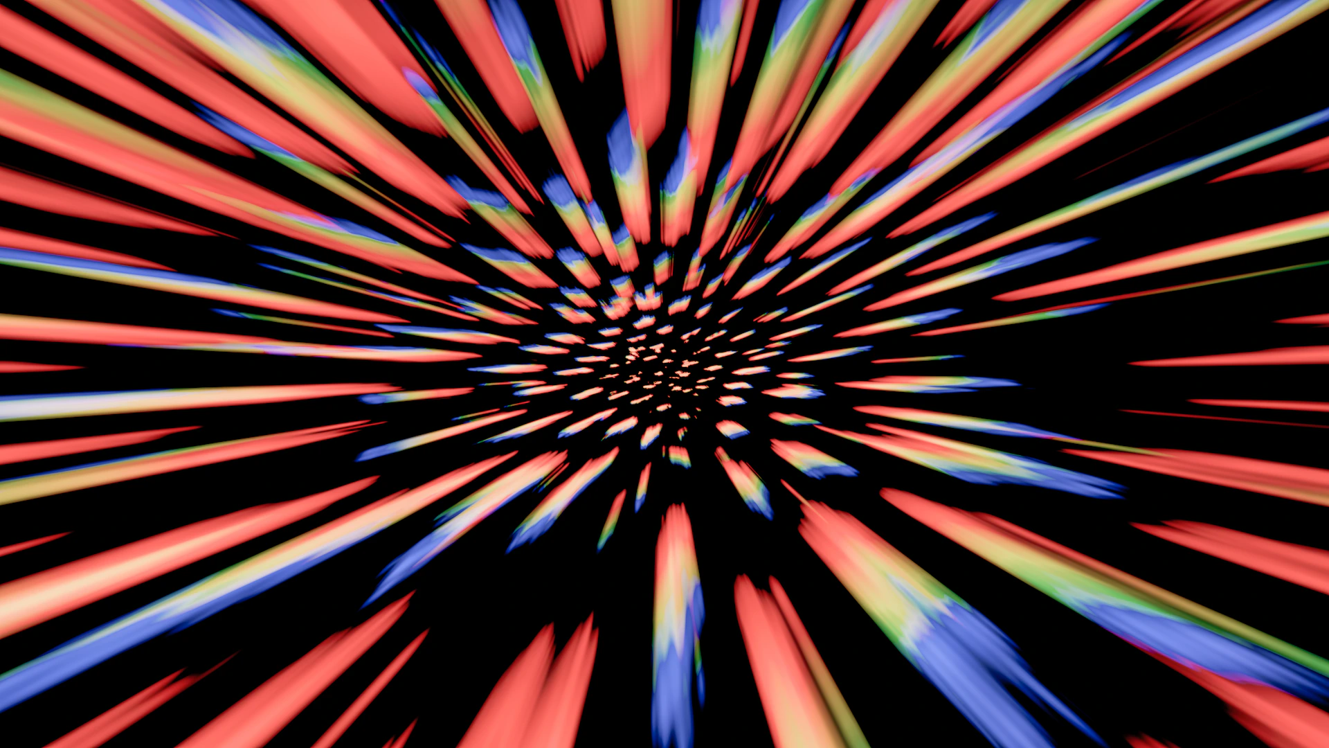 An abstract image of a starburst in red, blue, and yellow