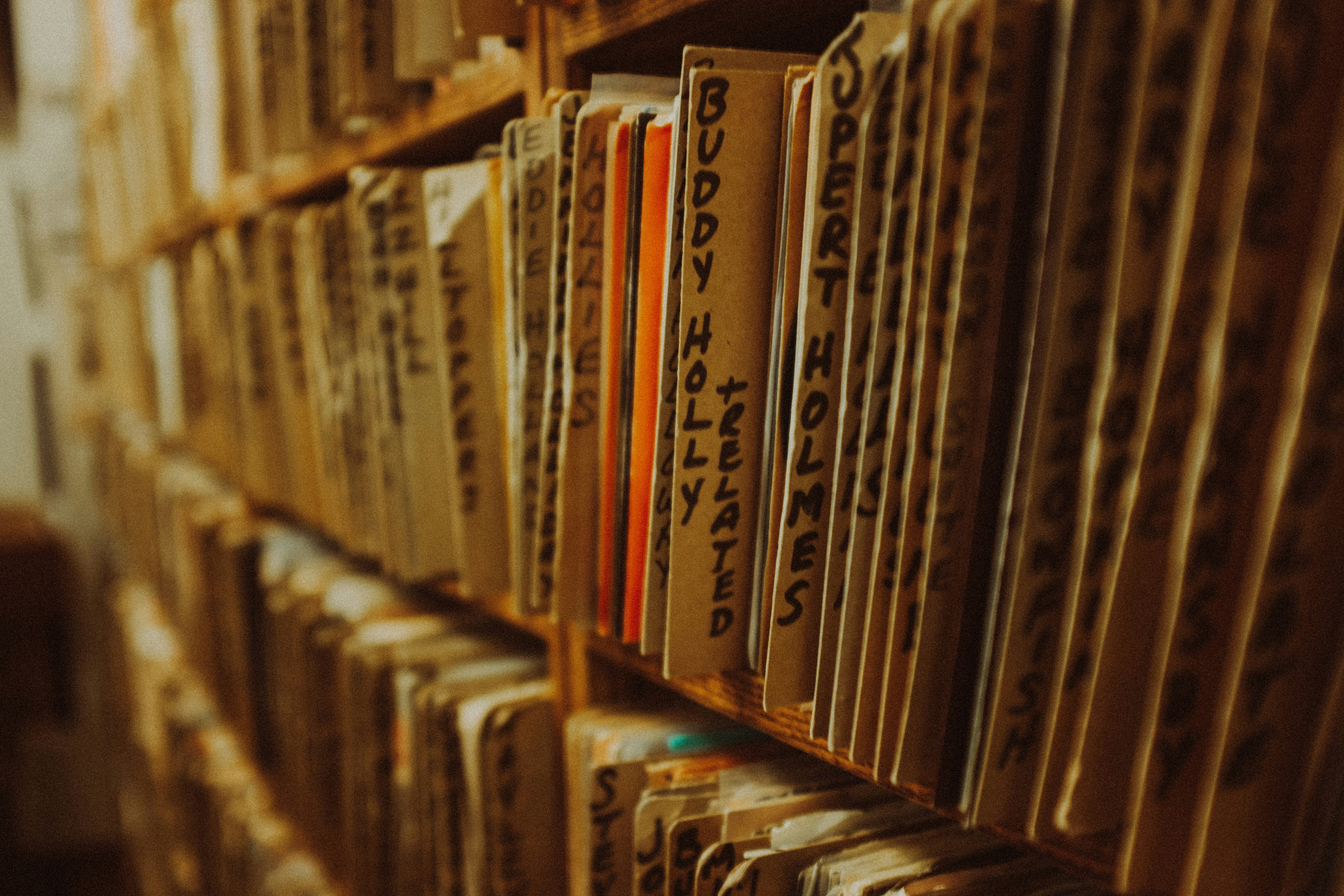 A book shelf filled with lots of books