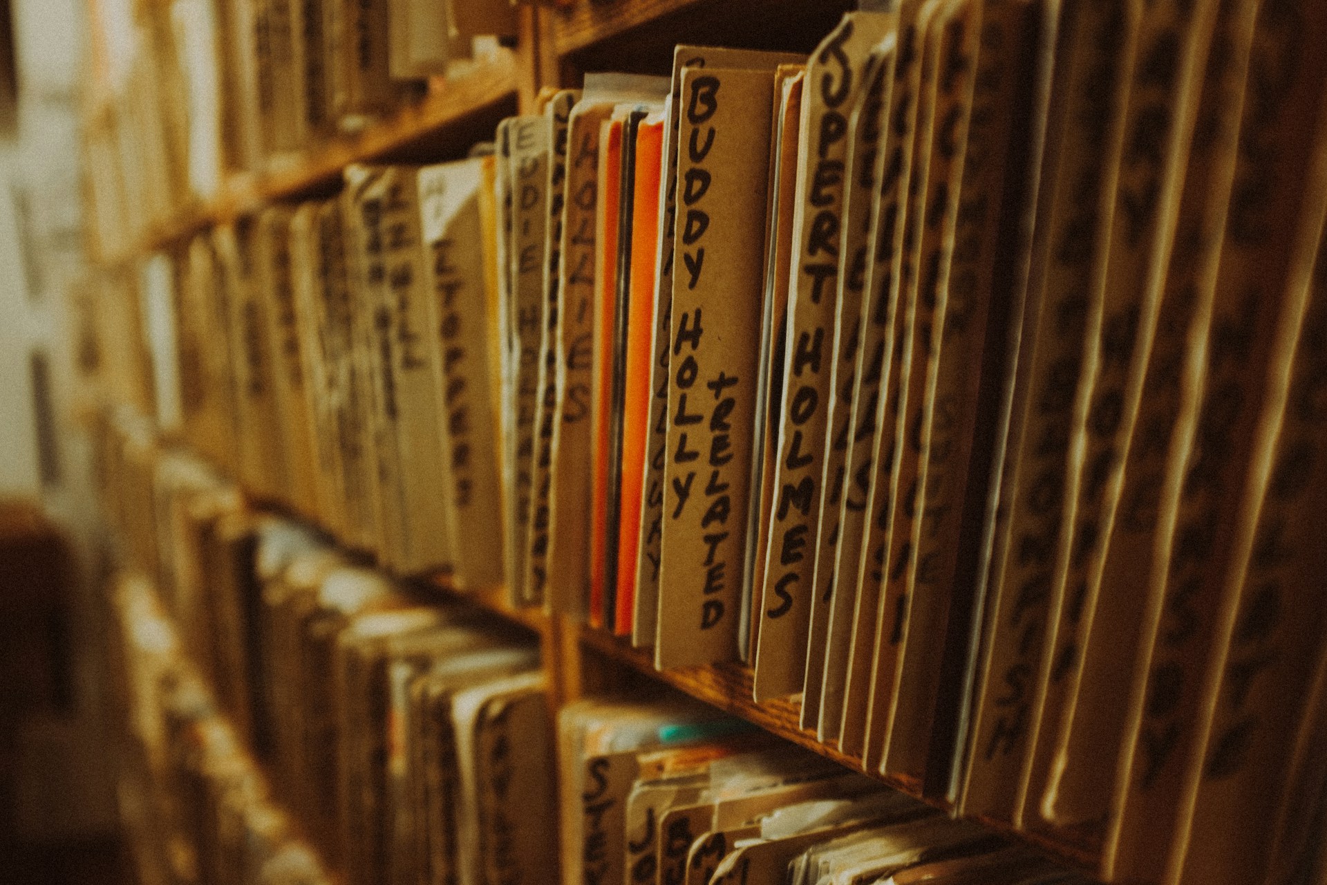 A book shelf filled with lots of books