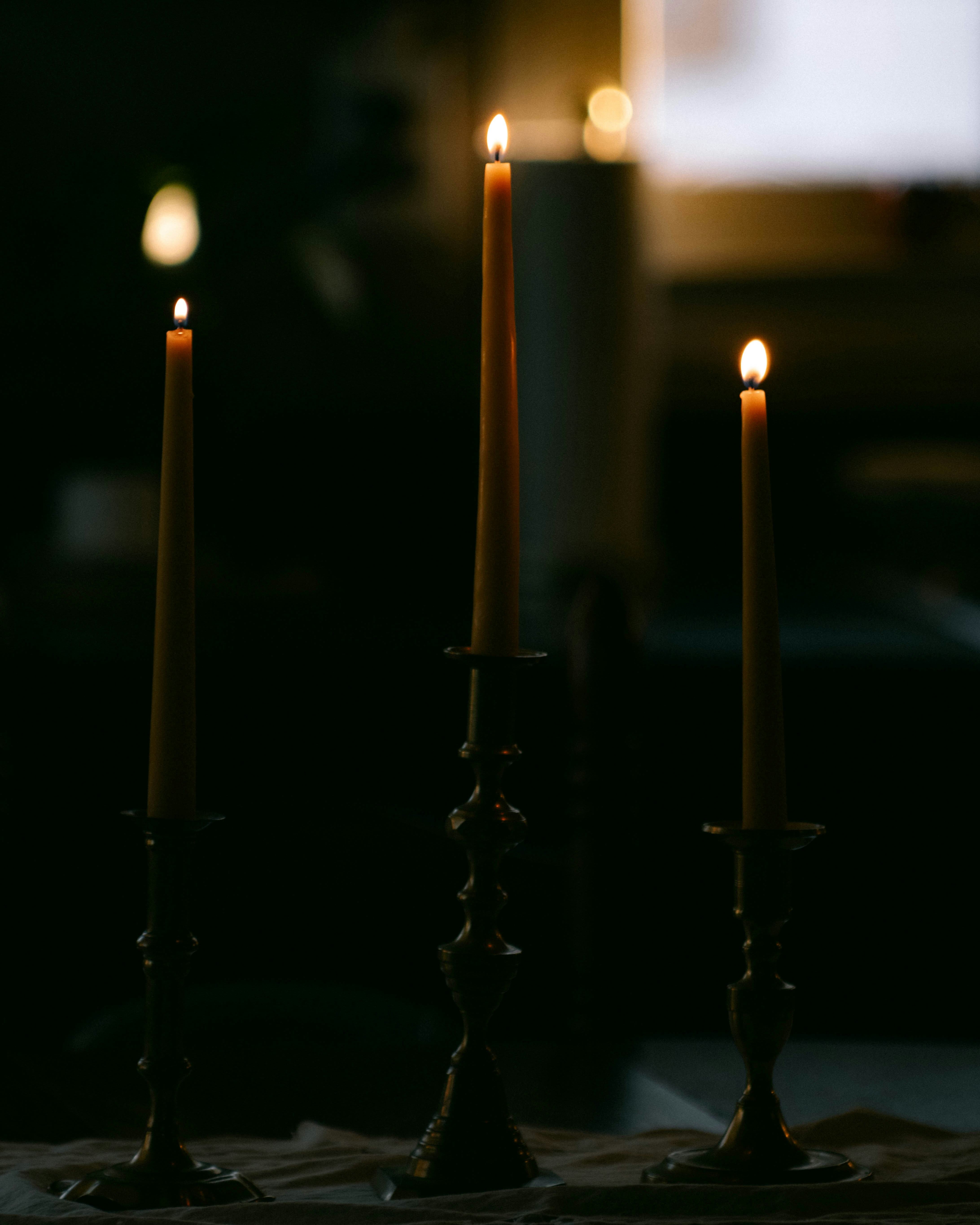 A group of candles sitting on top of a table