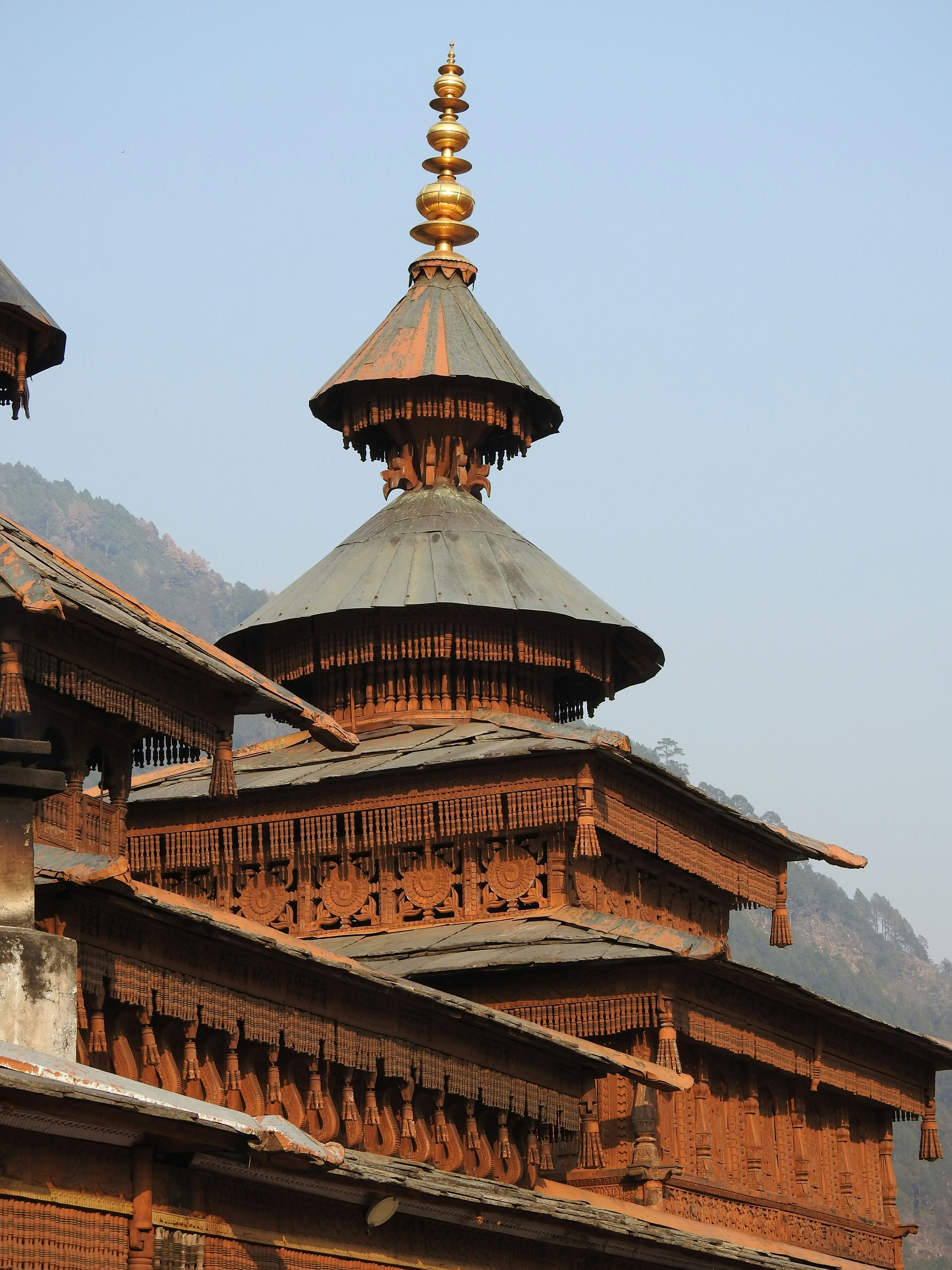 A tall building with a clock on the top of it