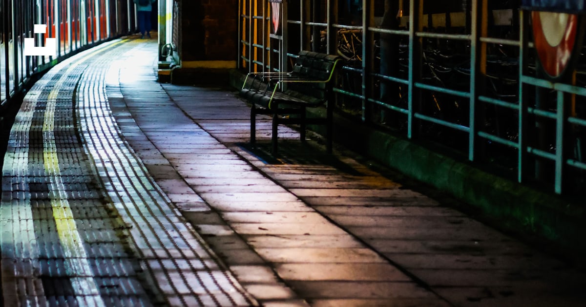 A train traveling down train tracks at night photo – Free Roding valley ...
