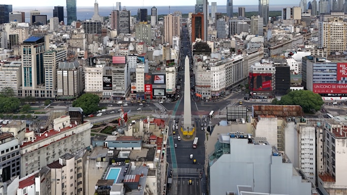 An aerial view of a city with tall buildings