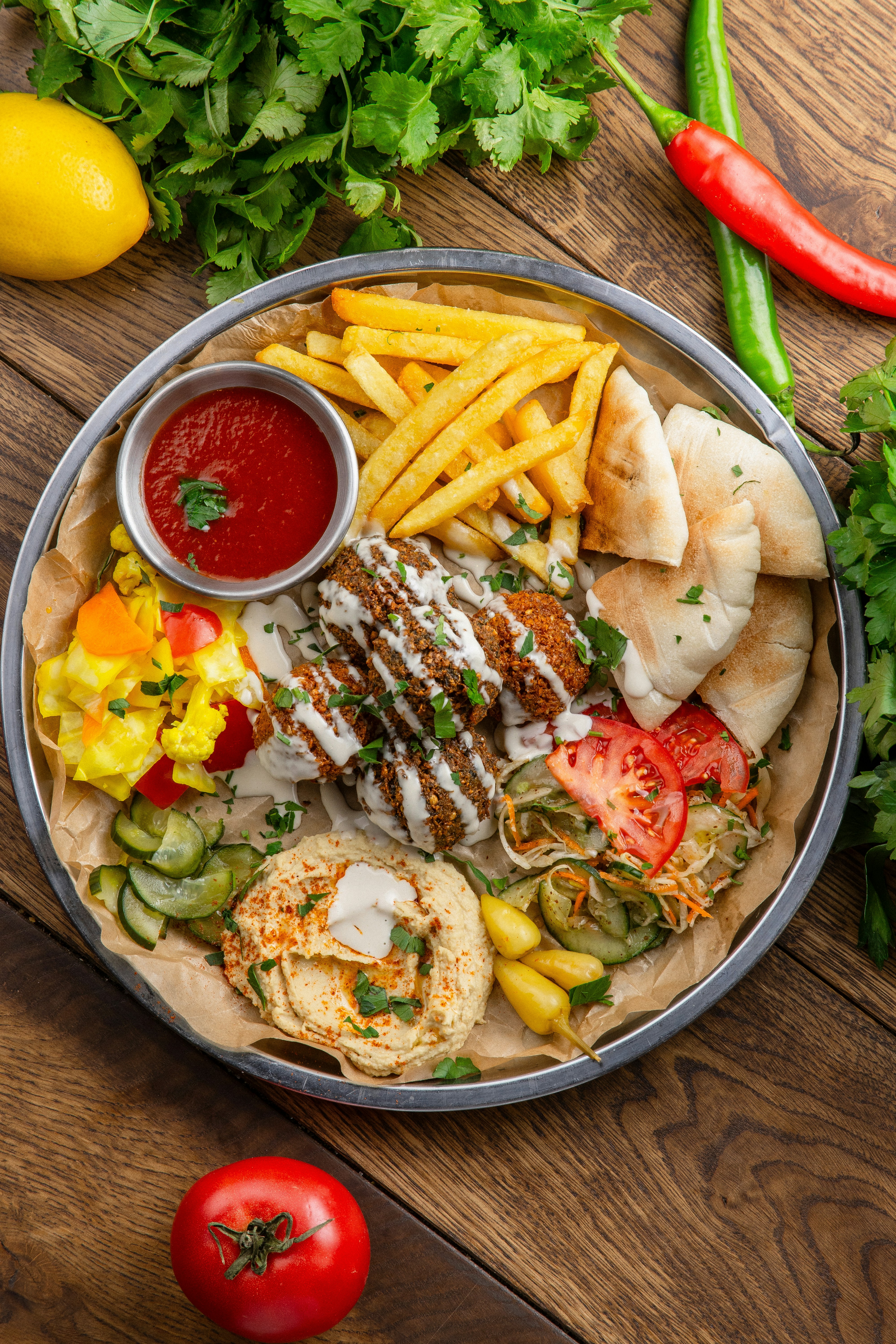 A plate of food on a wooden table