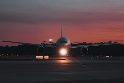 A large jetliner sitting on top of an airport tarmac