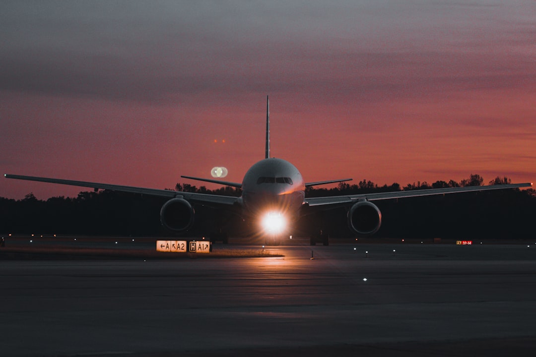 A large jetliner sitting on top of an airport tarmac,