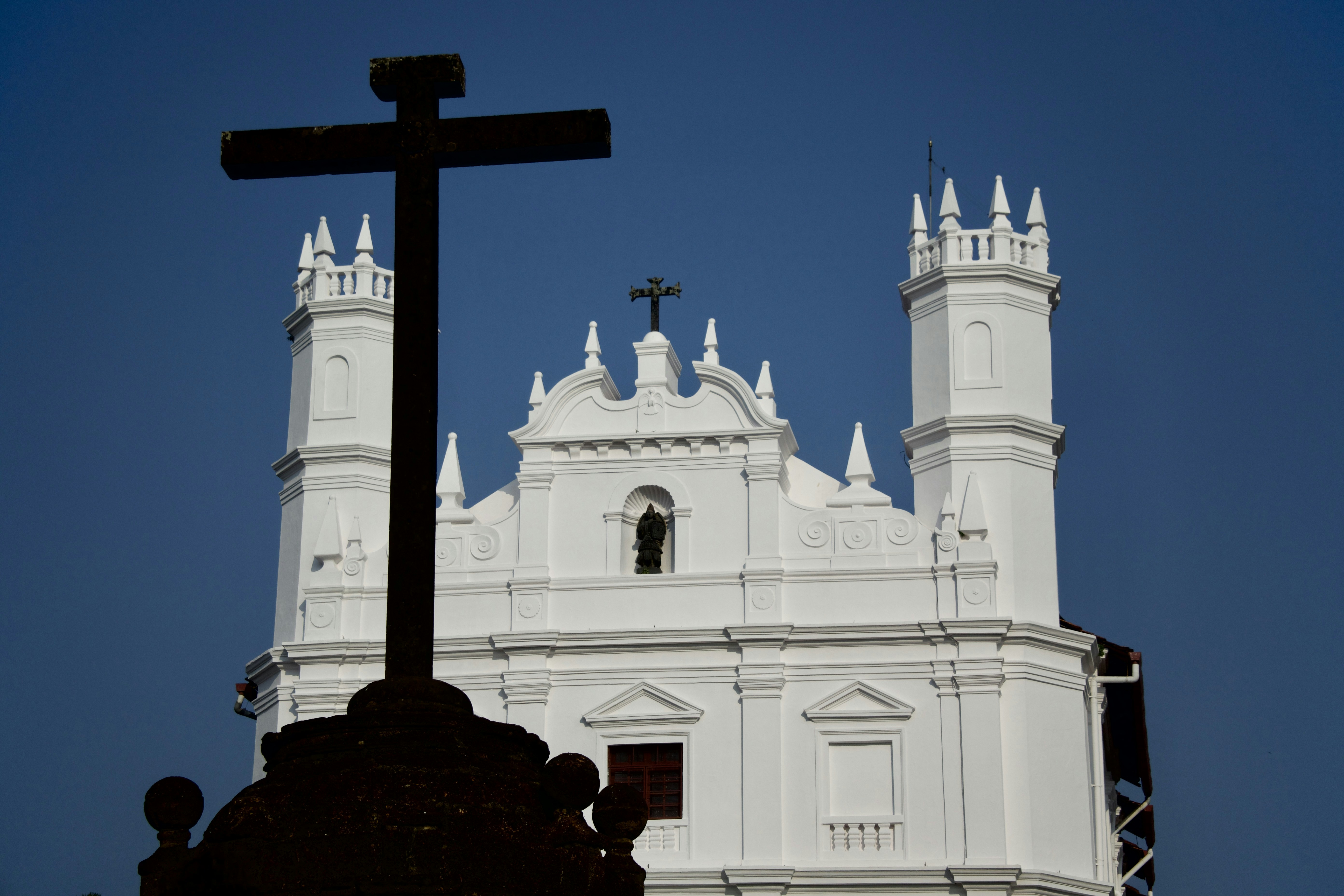 a church behind a cross