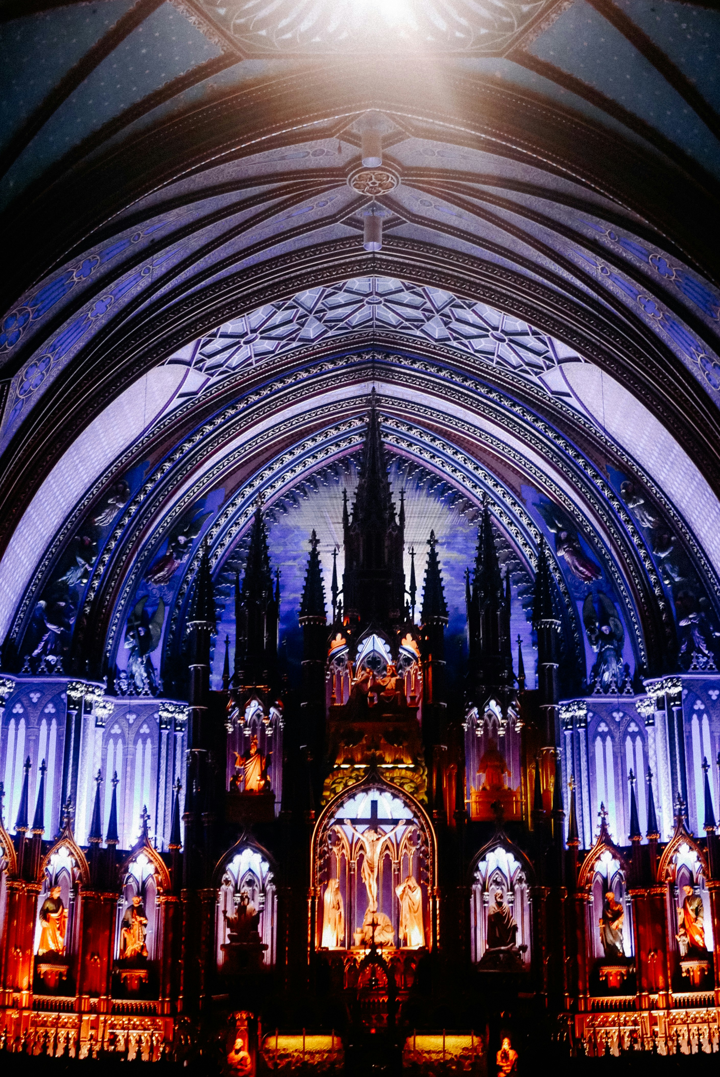 A large cathedral with a clock on the front of it