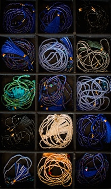 A box filled with lots of different colored cords
