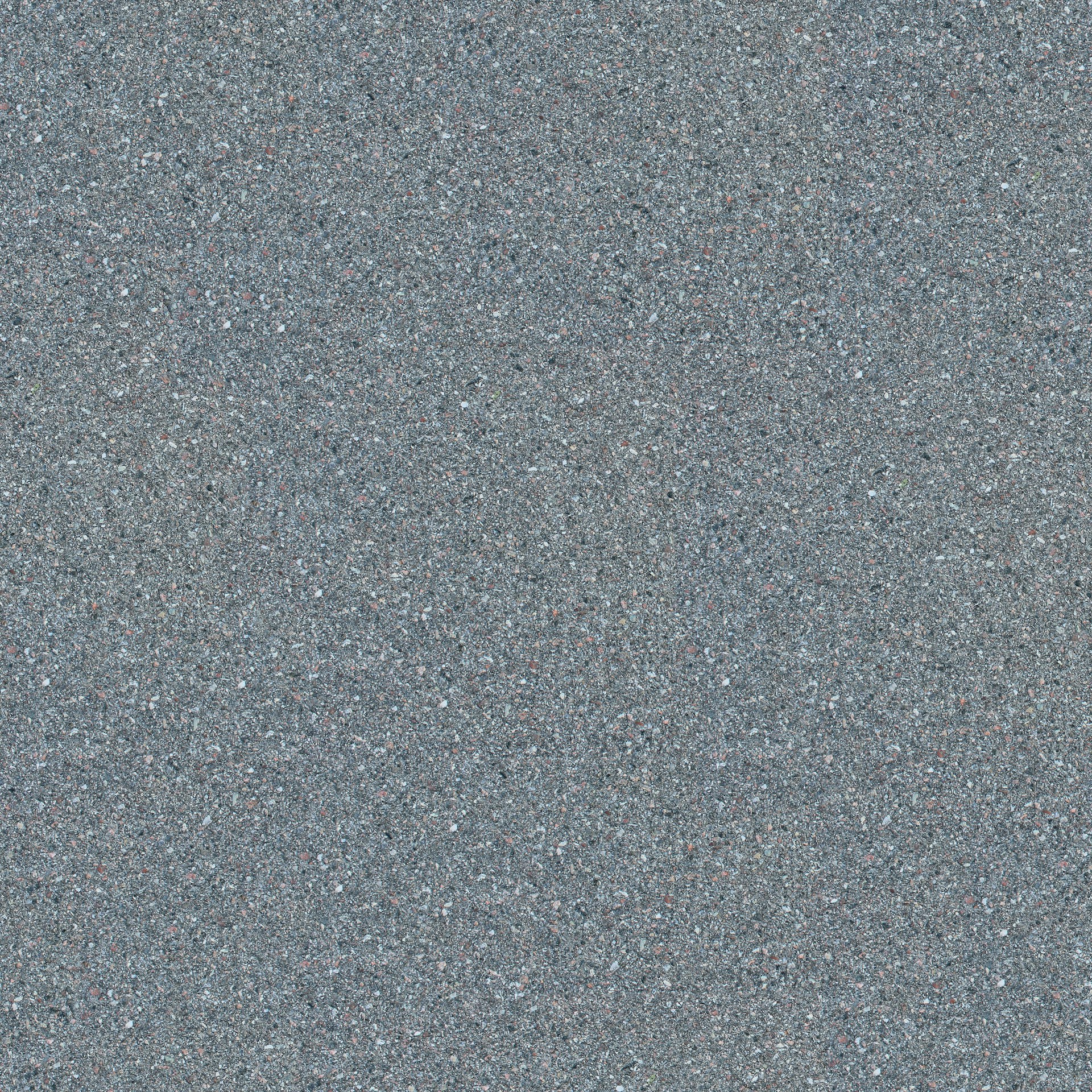A close up of a gray surface with small dots