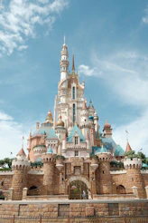 A large castle with a sky background