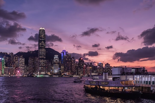 A large body of water with a city in the background