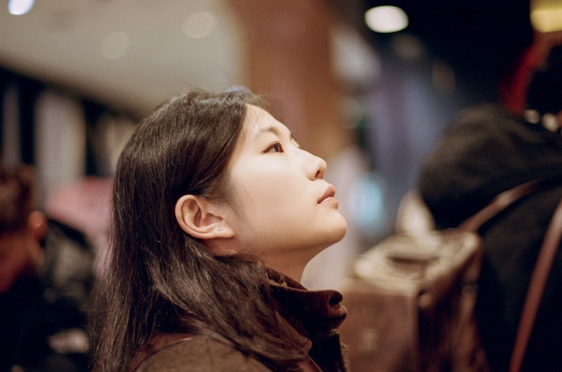 Glamorous woman gazing upward in Tokyo
