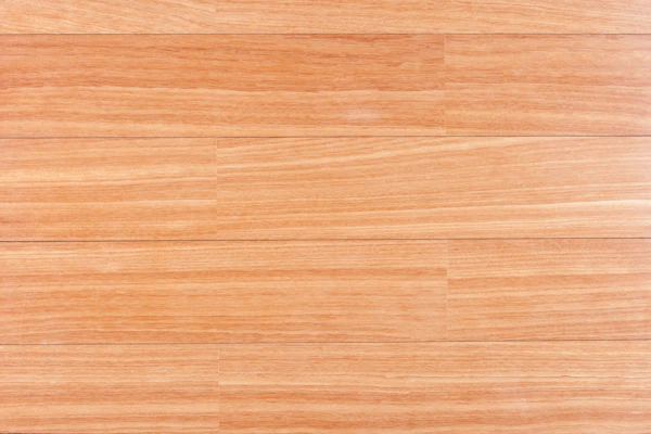 Wood Floor Maintenance: A close up of a wooden surface with a white background