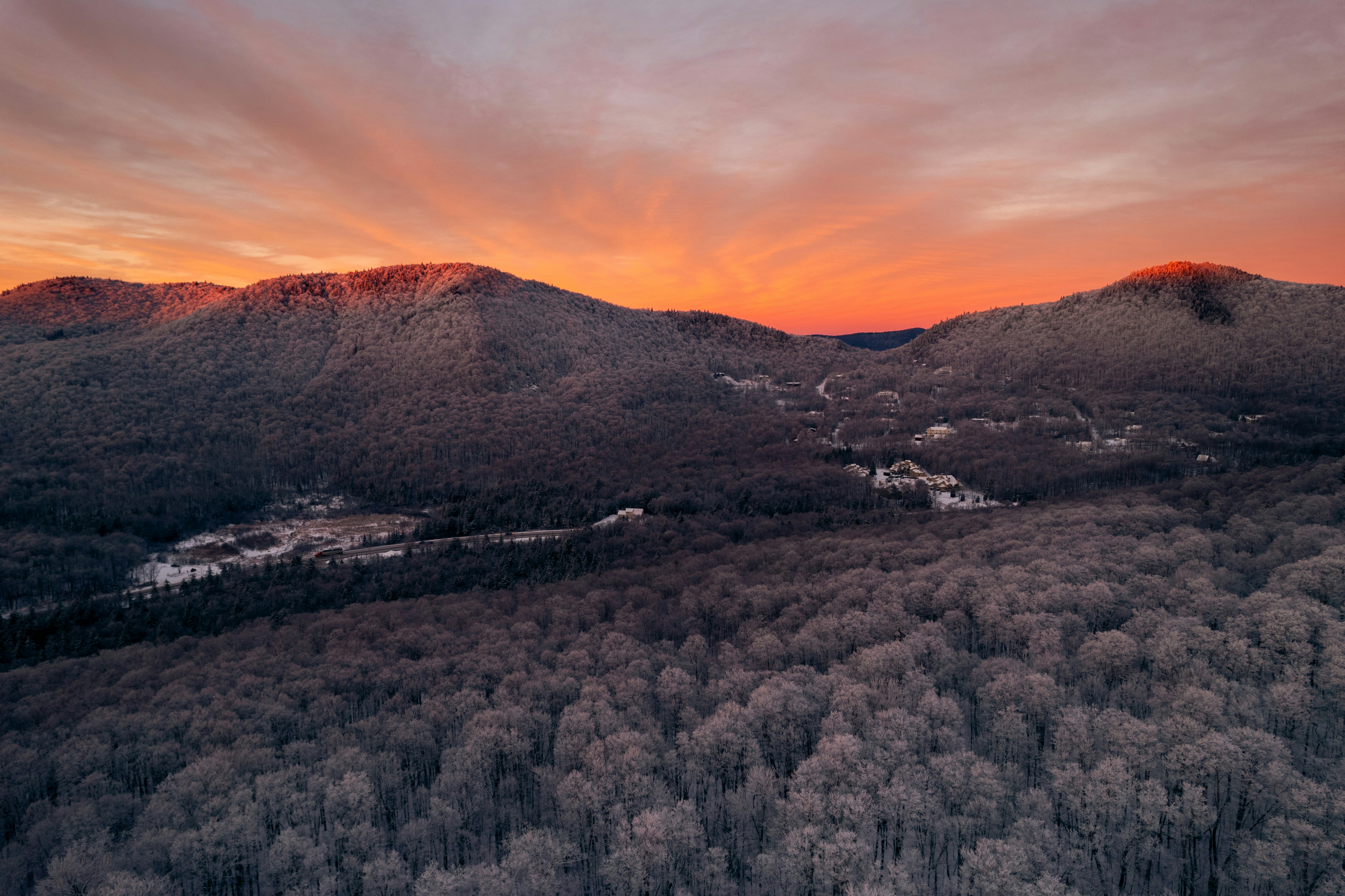 A view of a sunset over a mountain range, Sunset in Vermont