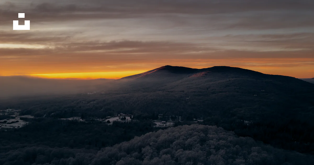 Sunset Rutland Vt A view of a mountain with a sunset in the background photo – Free ...