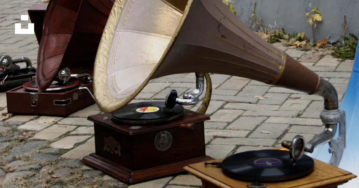 Old Time Instrments A group of old fashioned musical instruments sitting on the ground ...