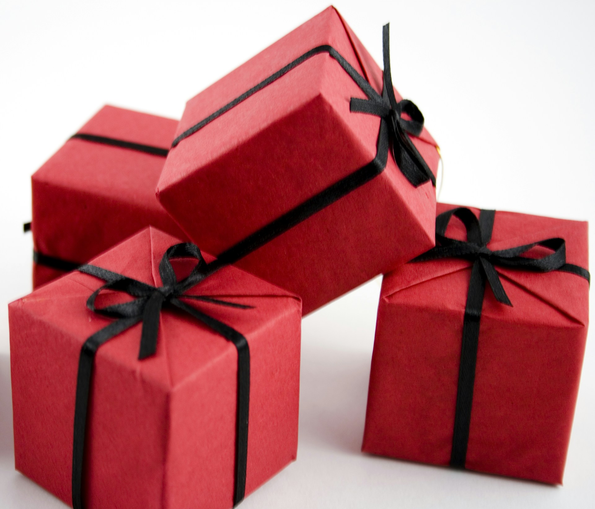A group of red boxes with black bows