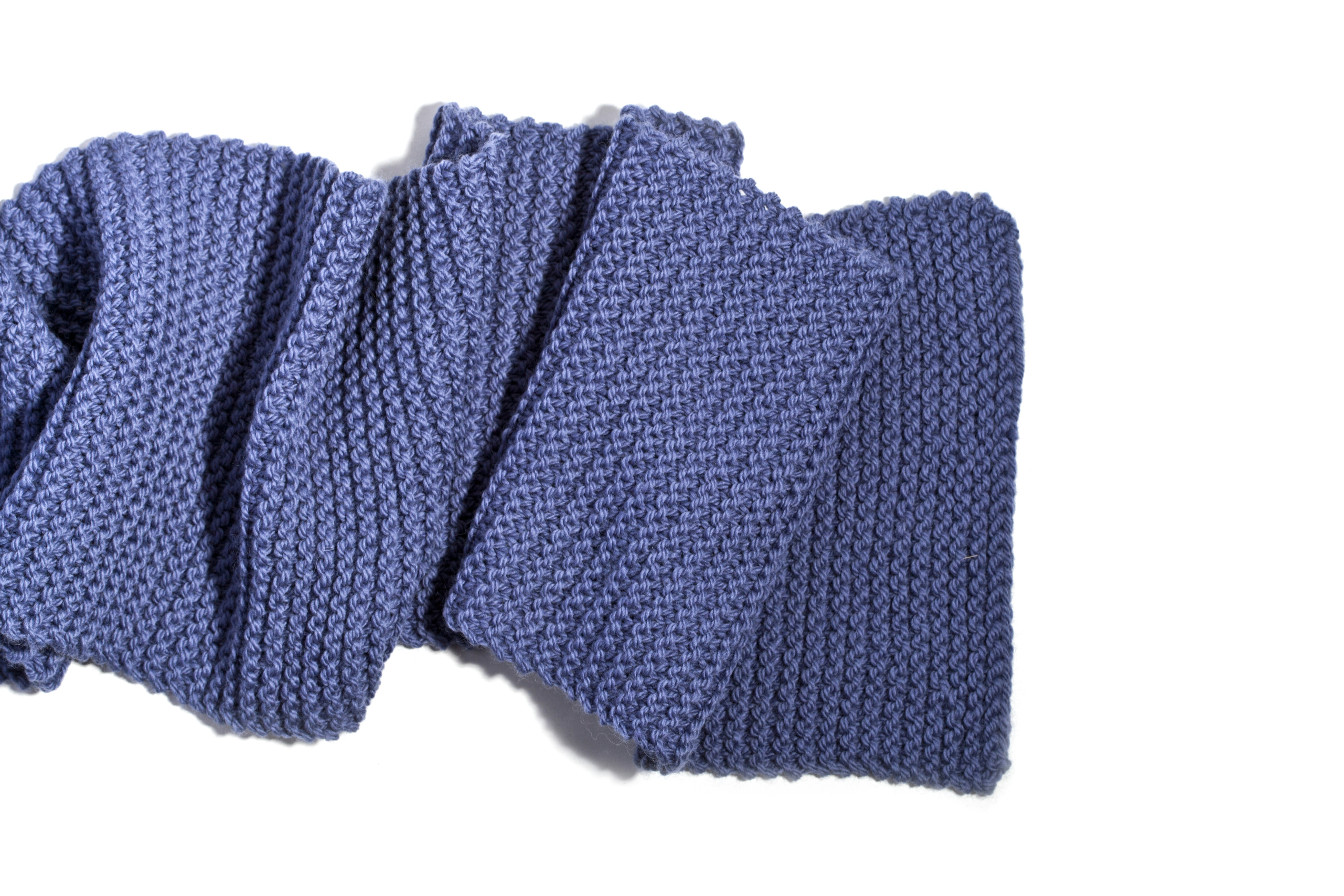 A pair of woolen gloves