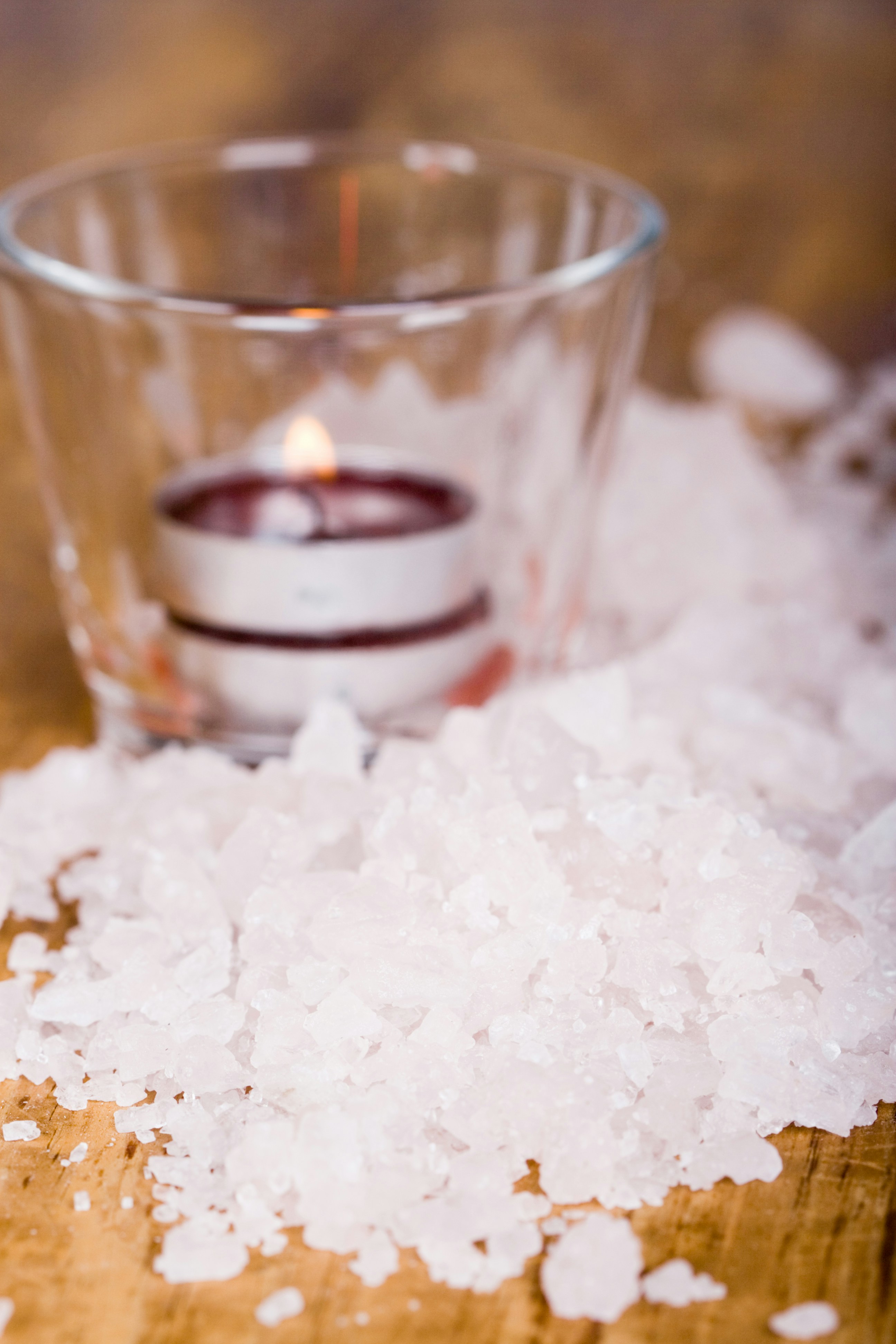 Sea salt and candle for a spiritual wealth cleansing ritual