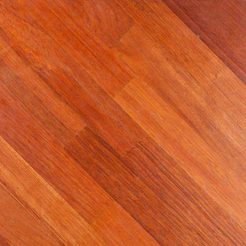 A close up of a wooden floor with a dog laying on it