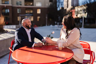 A man and a woman sitting at a table