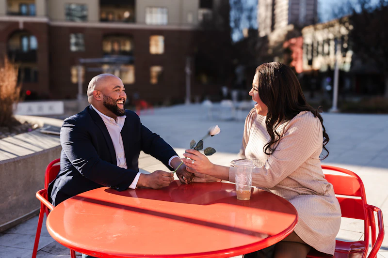 professional couple talking at a table