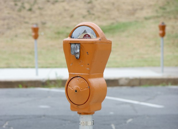 A parking meter on the side of a road, a reminder to check the time on your meter or pay app when parking in downtown Las Vegas