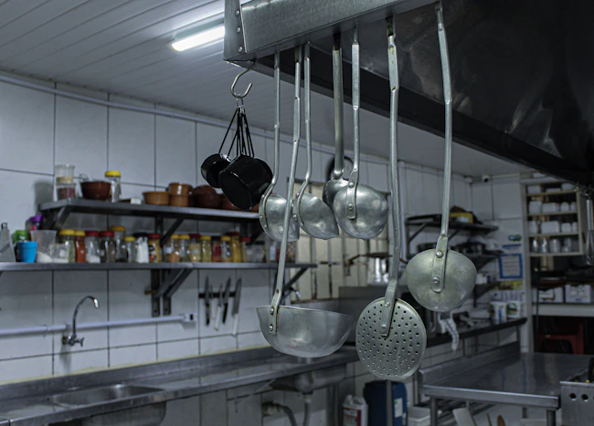 A kitchen filled with lots of pots and pans