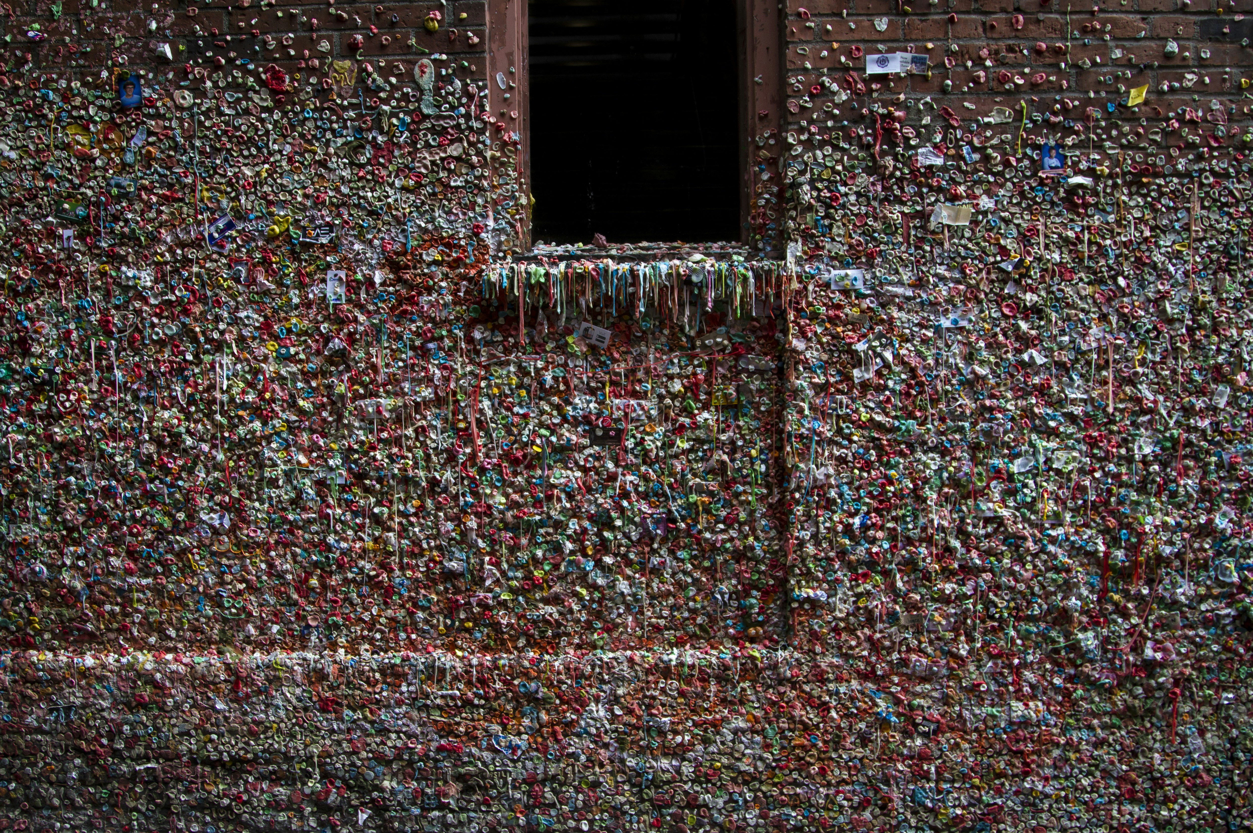A building with a lot of bottle caps all over it