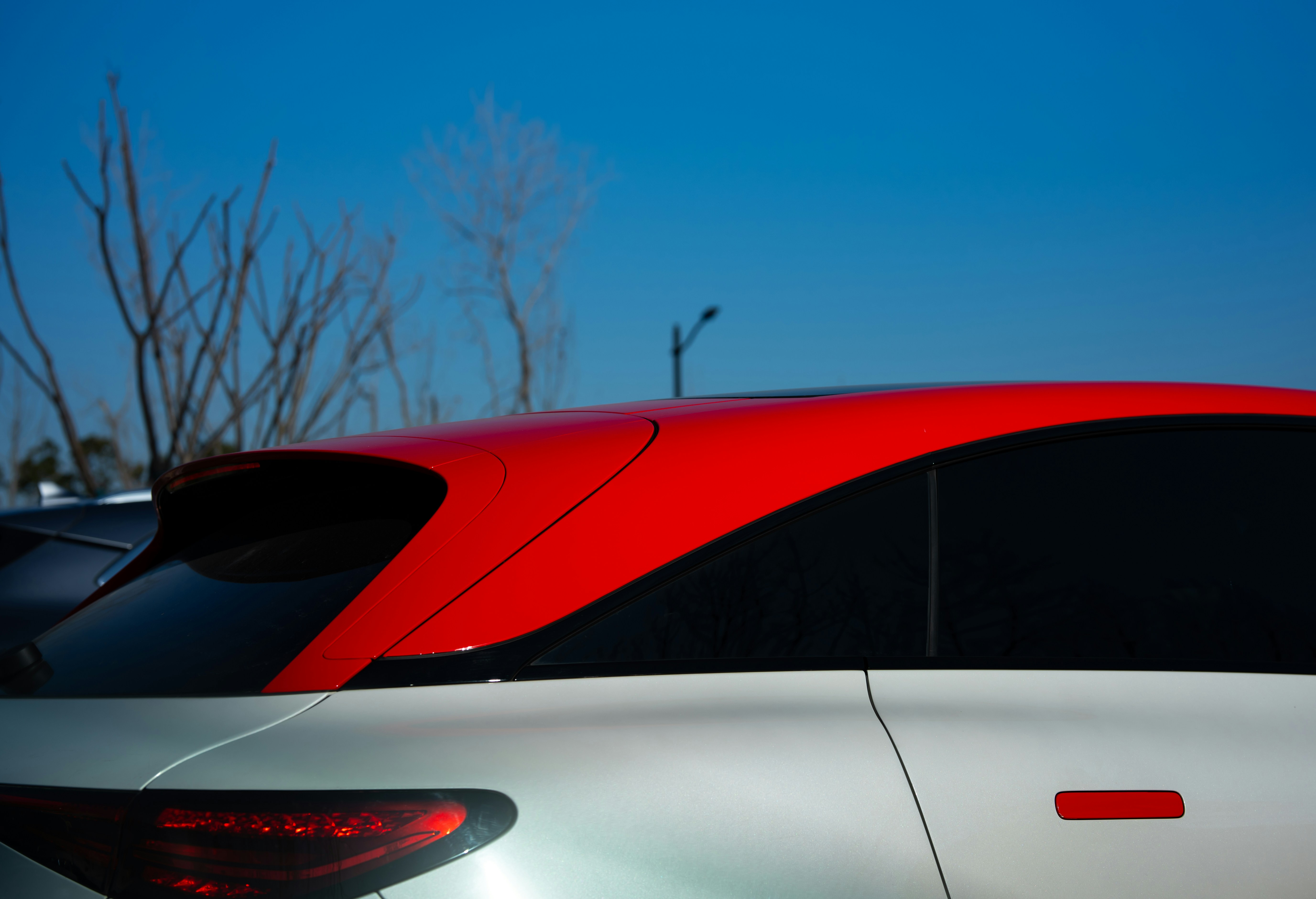 A close up of a car with its lights on