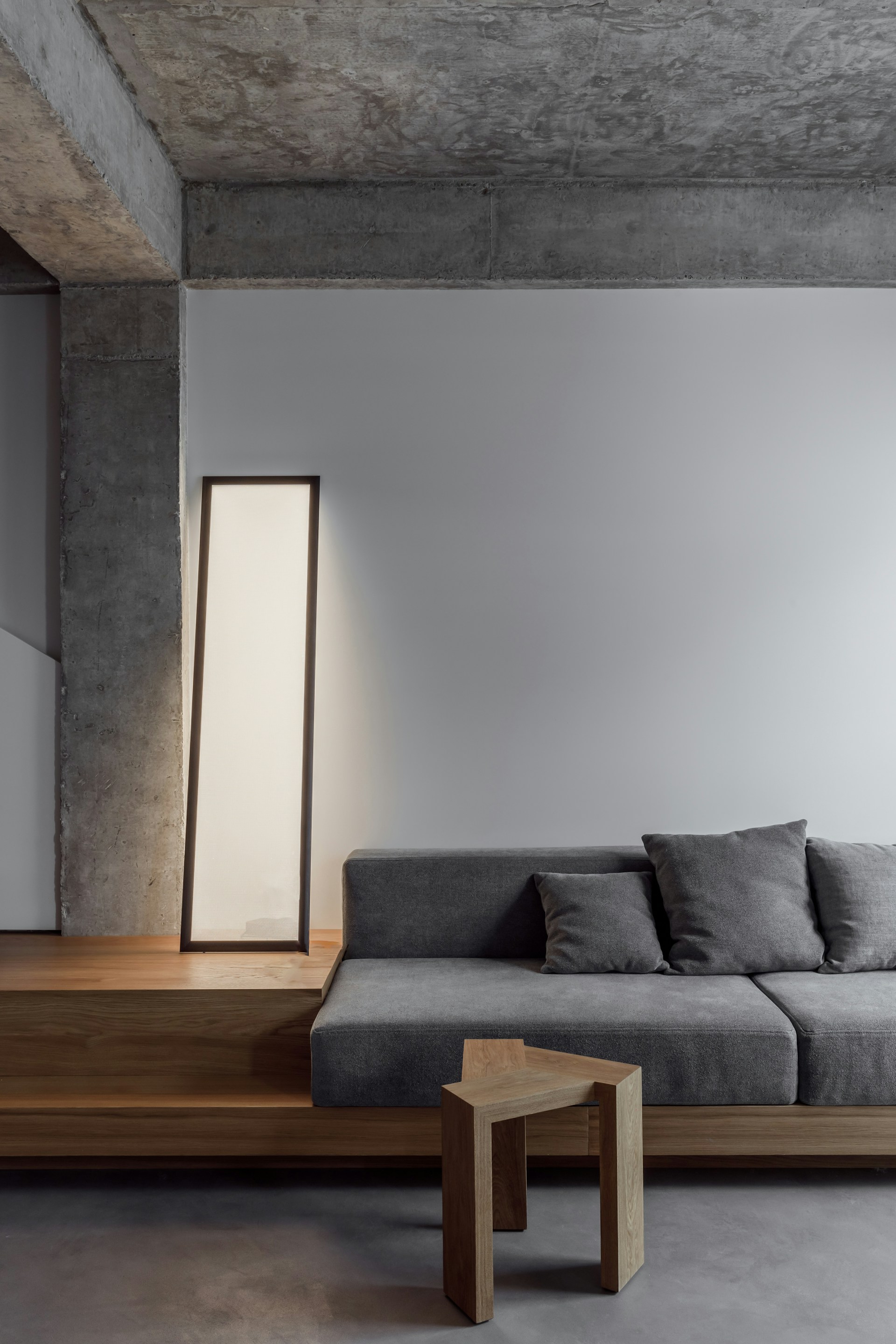 A living room with a couch and a table