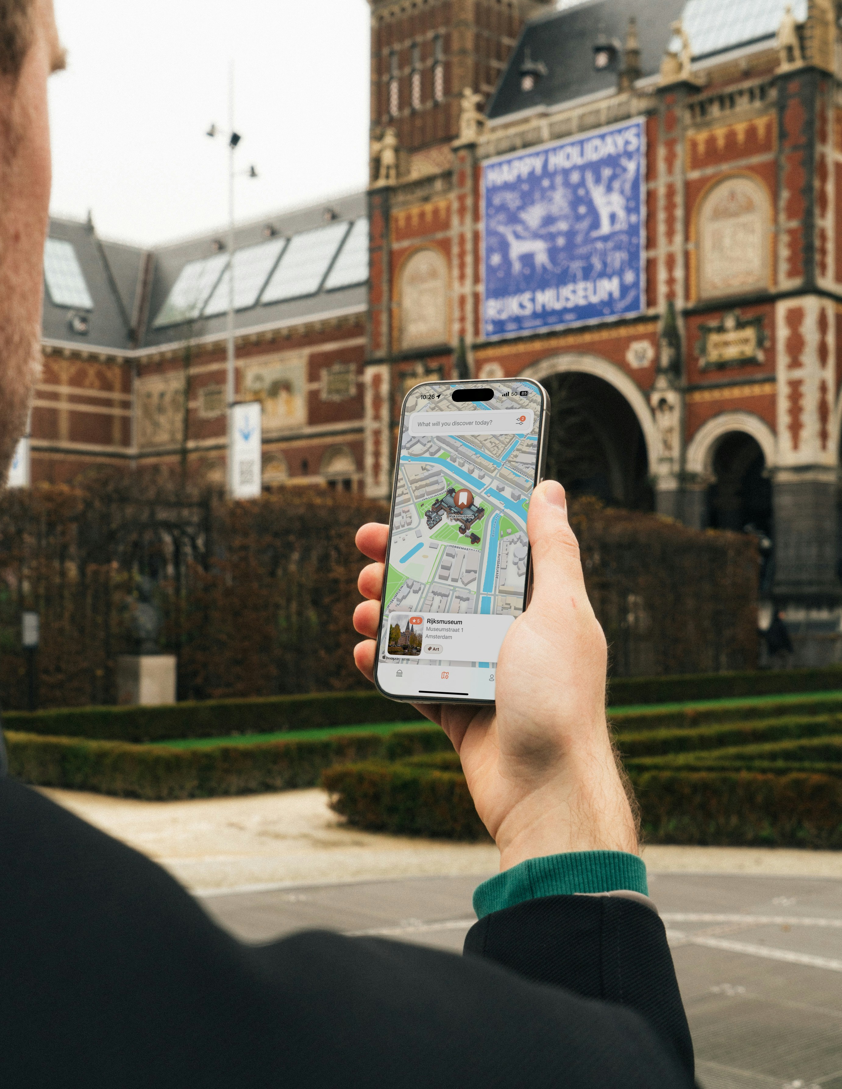 A man looking at a map on his phone