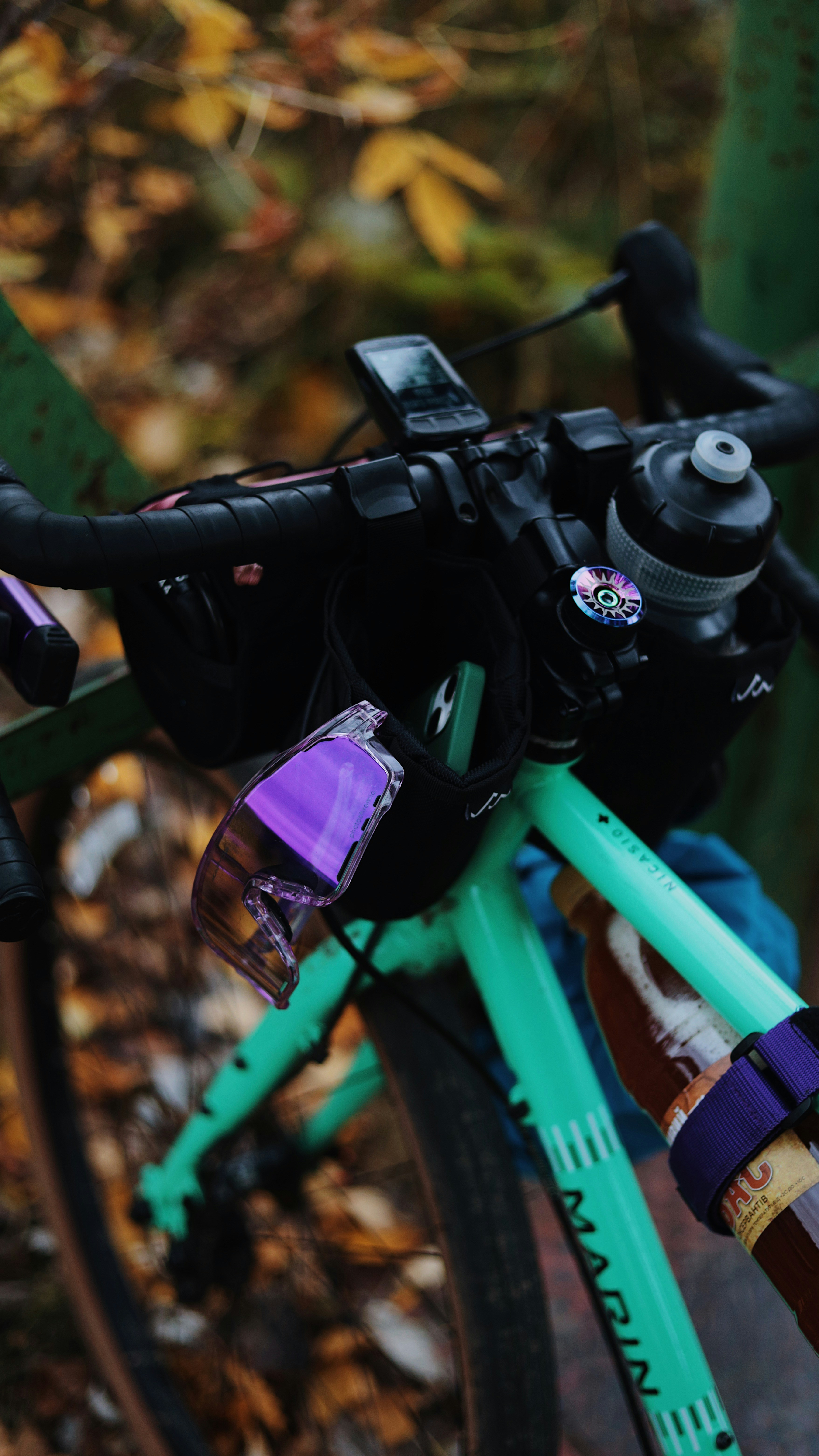 A close up of a bicycle with a camera attached to it