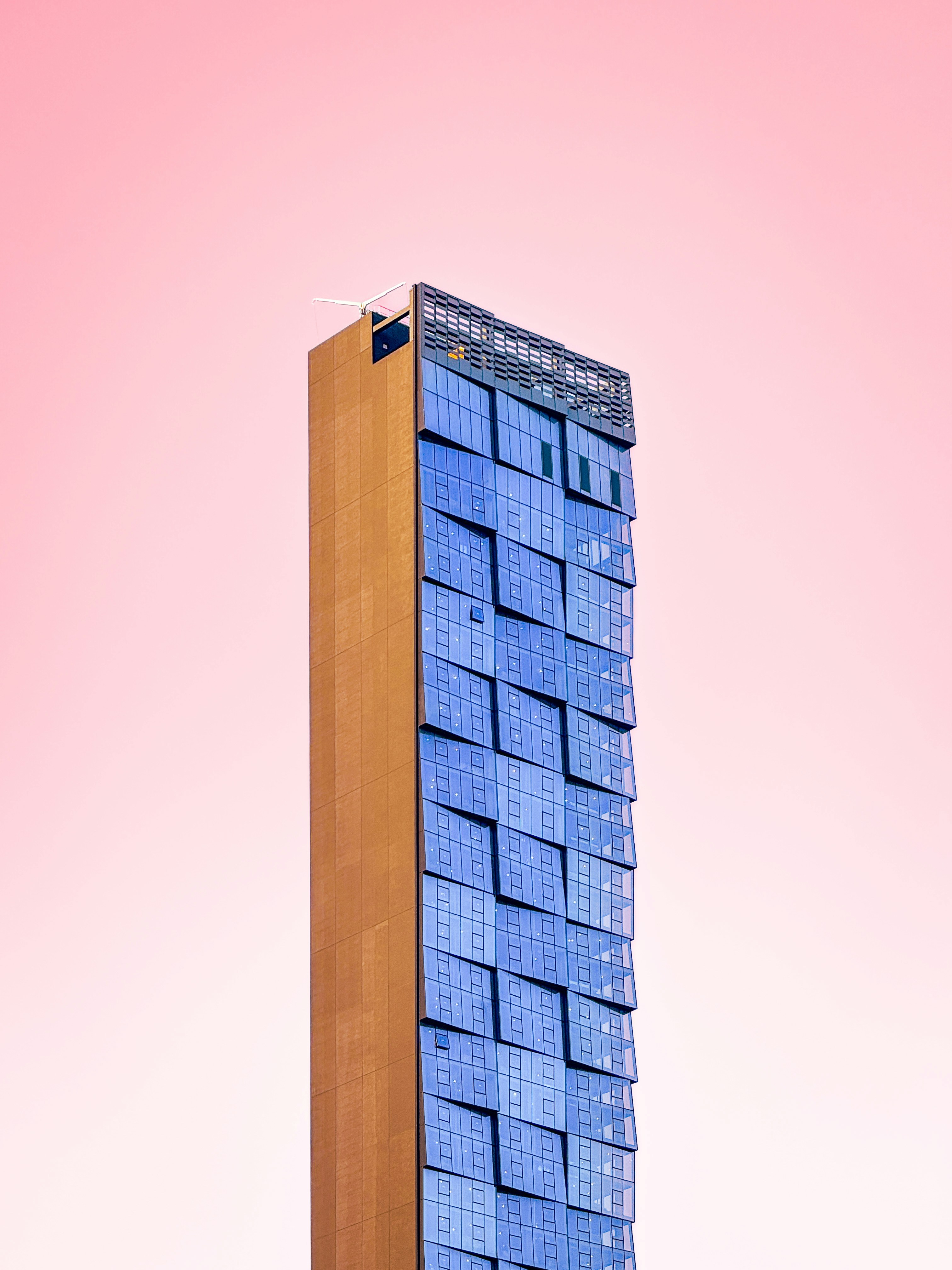 A very tall building with a lot of boxes on top of it