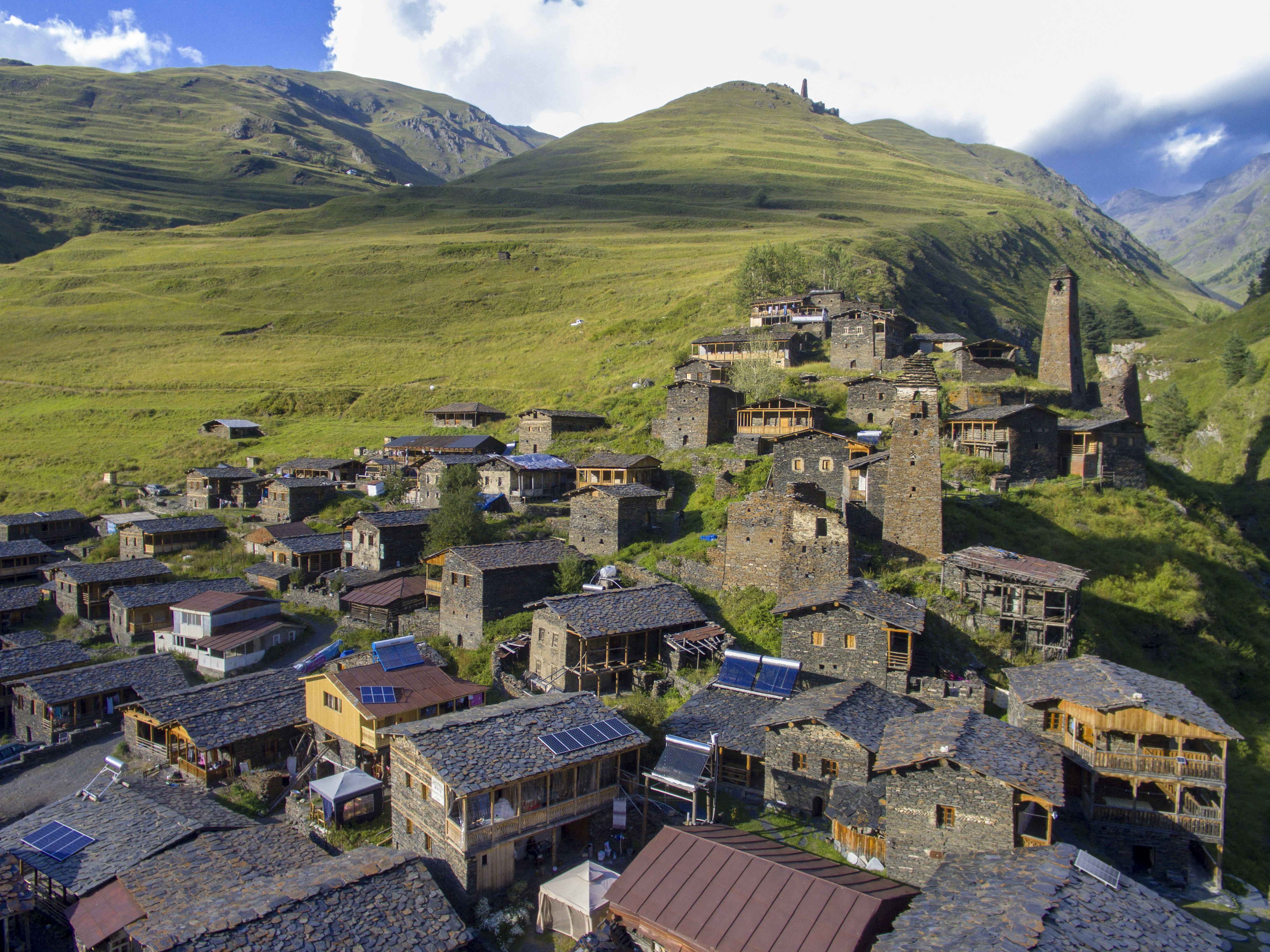 An aerial view of a village in the mountains